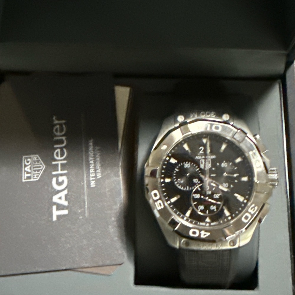 TAG Heuer Mens Silver and Black Watch with Chrono and date